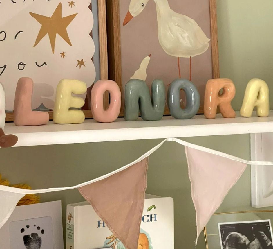 Individual letter name stands